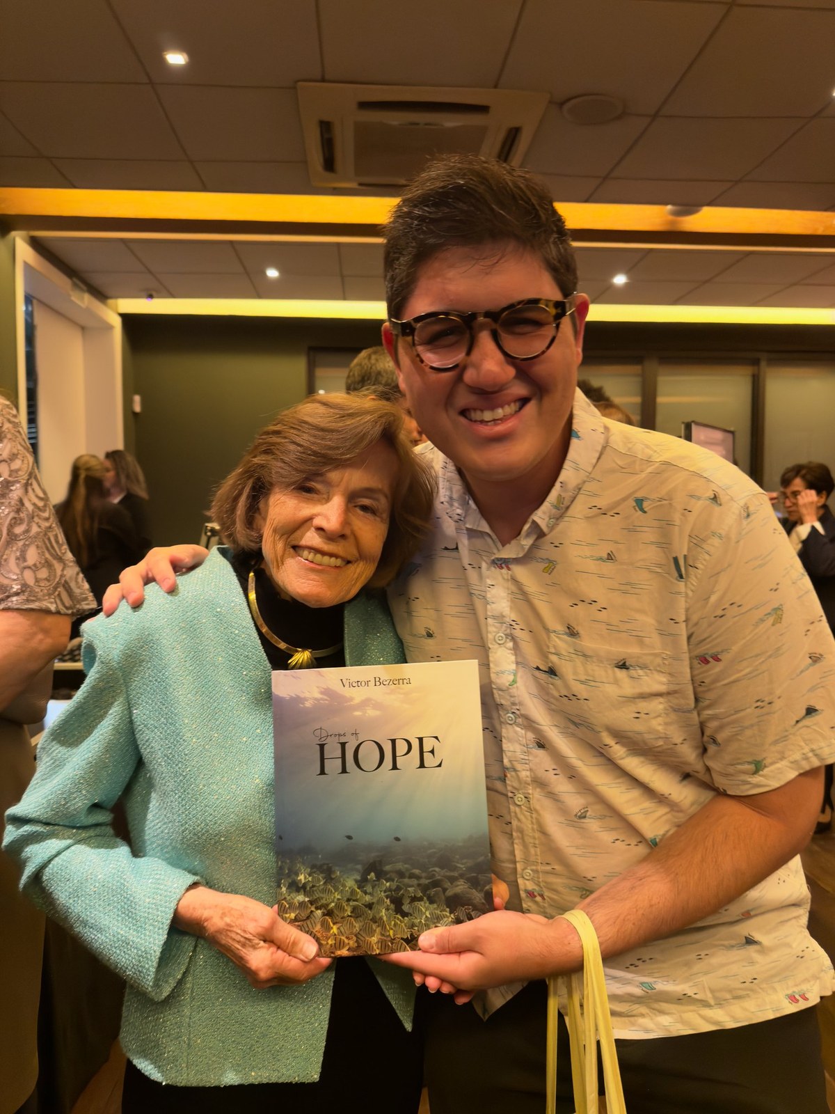 Victor Bezerra presenting Drops of Hope to Dr. Sylvia Earle